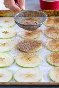 someone is grating the seeds on zucchini slices