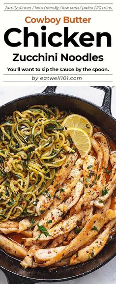 chicken zucchini noodles in a skillet with lemon wedges