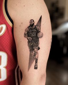 a man with a basketball tattoo on his arm