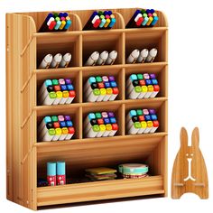 a wooden toy shelf with many different items on it