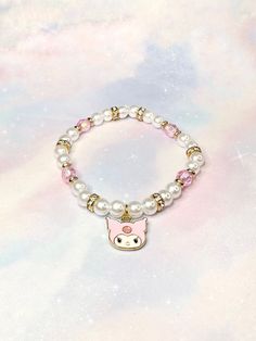 The Pink Kutie Bracelet is an adorable variation of KuromÍ's aesthetic while also being stylish & wearable. Made with accent iridescent pink beads, these beads shimmer and have hints of purple in certain lights.  The gold accents and rhinestones truly highlight the pinks within the bracelet ♡ ☾ ✧.* -6.5 inches (stretchy band) *.✧ ☾  ･ ｡ﾟ☆: *.☽ .* :☆ﾟ.  Handmade with love & moon magic ♡  ･ ｡ﾟ☆: *.☽ .* :☆ﾟ.  - (In CANADA) I ship through lettermail in order to provide free shipping and trying to ke Handmade White Harajuku Jewelry, Harajuku Style Handmade White Jewelry, Adjustable Pink Kawaii Charm Bracelet, Adjustable Pink Kawaii Jewelry, Hello Kitty Adjustable Jewelry For Gifts, Adjustable Hello Kitty Jewelry As Gift, Adjustable Hello Kitty Jewelry Gift, Cute Pink Crystal Bracelet With Round Beads, Cute White Hello Kitty Jewelry