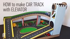 a toy train set with cars and trucks on the tracks next to a sign that says how to make car track with elevator