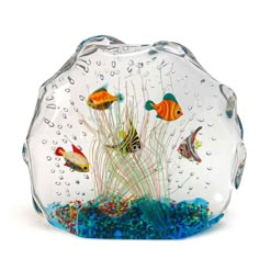 a glass bowl filled with water and colorful fish