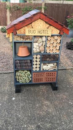 a bug hotel made out of wood and other things