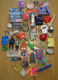 there are many different items on the table that have been placed in the shape of a heart