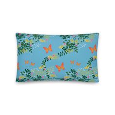 a blue pillow with butterflies on it