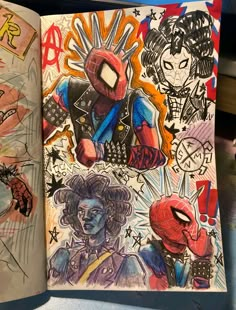 an open book with some drawings on the pages and spider - man characters in it