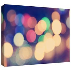 blurry image of colorful lights in the night sky canvas art print on wrapped canvas