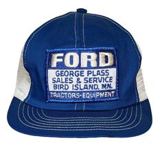 Vintage 1970's Ford George Plass Sales & Service Bird Island Minnesota Tractors and Equipment Snapback Trucker Patch Hat Cap . The cap is in nice condition however it has had its foam removed and it has a crease in its brim in one area. Still a great looking vintage Ford Cap. Vintage Trucker Cap For Spring, Vintage Trucker Hat For Spring, Vintage Trucker Hat With Flat Bill For Spring, Spring Vintage Trucker Hat, Vintage Trucker Hat For Spring, One Size Fits Most, Vintage Trucker Hat With Logo Patch And Flat Brim, Vintage Adjustable Trucker Hat, Vintage Spring Trucker Cap, Vintage Outdoor Snapback Trucker Hat