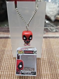 This is a 20 inch necklace. Deadpool bitty pop as the charm. Comes with the box for the character. Silver chain Bitty Pop, 20 Inch Necklace, Mesa Az, Charm Necklaces, Deadpool, Charm Necklace, Silver Chain, Beautiful Jewelry, Necklace Etsy