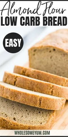 sliced loaf of low carb bread on a cutting board with text overlay that reads, almond flour low carb bread