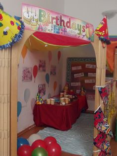 a birthday party with balloons and decorations