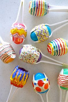 colorful candy lollipops with sprinkles on them