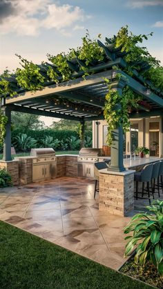 an outdoor kitchen and dining area is shown in the evening sun with green plants growing on the pergolated roof