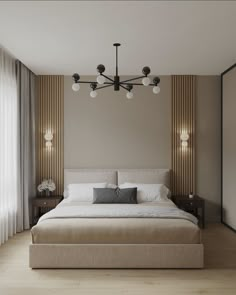 a large bed sitting under a chandelier in a bedroom next to a window