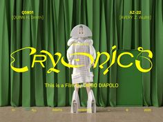 an image of a robot standing in front of a green curtain with the words tropic on it