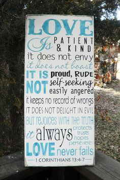 a sign that says love is patient, it does not kind and it does not envy