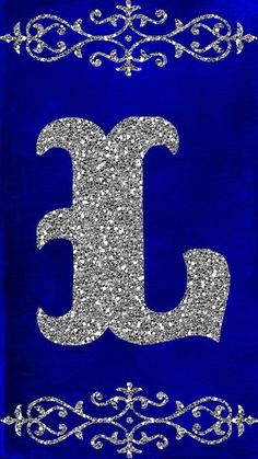 the letter e is made up of silver glitters and blue paper with an ornate border