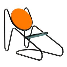 an orange chair sitting on top of a metal stand