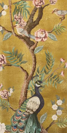 a bird sitting on top of a tree next to flowers