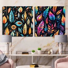 two paintings on the wall in a living room