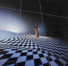 a person standing in the middle of a room with black and white checkered flooring