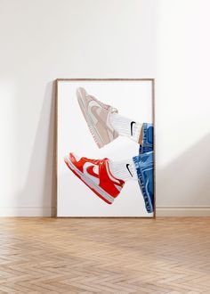 an image of two shoes in the air on a white wall above a wooden floor