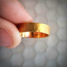 This is a nice thick and substantial solid 24k gold band with a natural hammered finish. The surface texture gives the ring a really cool soft glow. 24k gold is relatively soft, but the thickness and irregular finish makes this ring wearable. This ring is approximately 5.5MM wide. I think that the color of real 24k gold has no match, it is absolutely beautiful. Even if you look for one, there are not many rings available like this. Thanks for checking this ring out! Please look at my customer re Recycled Gold Ring, Handmade Wedding Band, Hammered Gold, Etsy Gold Ring, Recycled Gold, Gold Wedding Band, Handmade Wedding, Gold Style, Gold Bands