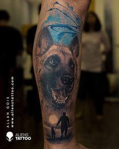 a man's leg with a dog tattoo on it and an image of a bear