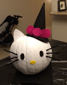 a hello kitty pumpkin sitting on top of a table