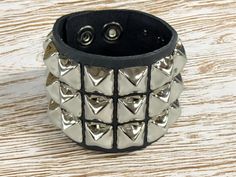 Three Row 5/8" Pyramid Stud  Bracelet Genuine Cowhide 7oz Weight Leather Bracelet Snap Bracelet 7oz Cowhide Leather Military Grade Rust Protected Spikes Width-2 1/4" Wide SIZE:    ALL BRACELET ARE 9"-9 1/2" LONG.  FITS 7"-9"  WRISTS Snap Bracelets, Military Grade, Punk Rock, Cowhide Leather, Favorite Jewelry, Cuff Bracelets, Leather Bracelet, The Row, Jewelry Bracelets