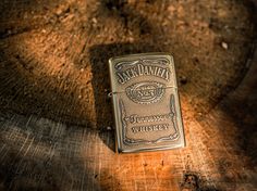 a lighter sitting on top of a wooden table