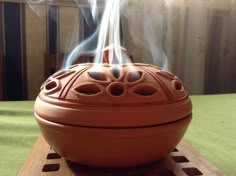 My incense burner with Bakhoor and Oud Bakhoor. Smells so good. Ceramic Insence Burner, Insent Burner Clay, Bukhoor Burner, Bakhoor Burner, Incense House Burner, معطر جو, Indian Ceramics, Handmade Clay Pots, Rangoli Side Designs