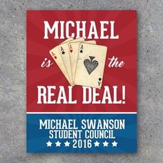 a magnet that says michael is the real deal with four playing cards in front of it