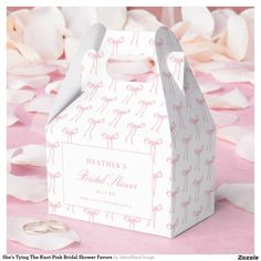 a white box with pink bows on it