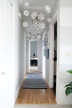 the hallway is decorated with white snowflakes