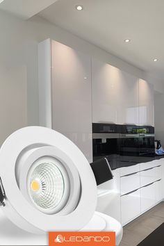 an image of a modern kitchen setting with white lighting