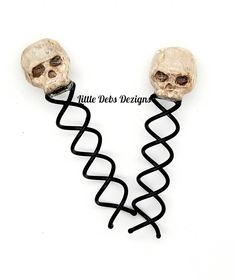 These beautiful skull spiral hair pins are made of polymer clay and made to order so no 2 are the same.  These are a great addition to your Halloween or cosplay costumes.  Each skull is handmade from polymer clay and secured onto a metal spiral pin. Each order comes with a set of 2 skull spiral hair pins, if you have a request for a specific color or color combination please feel free to message me.   As with all my items in my shop these are handmade to order so no 2 sets are exactly the same.  The approximate measurements are 3 inches long and skulls are approximately 1/2 inch to 3/4 inches. Tracking number will be provided upon shipment **I ship all my products packed with bubble wrap to make sure you receive a non-damaged item.** Goth Hair Pins, Diy Hair Accessories Organizer, Goth Hair Accessories, Monster High Fashion, Skull Keychain, Organizing Hair Accessories, Halloween Accessories Hair, Goth Hair, Skull Lover