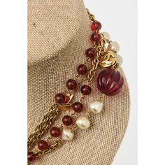 This fabulous long vintage Chanel sautoir necklace has red gripoix glass beads, faux pearls interspersed along the gold metal link chain. The red glass beads are 2 different sizes. It can wrap 2 or 3 times over on your neck or you can stagger it. It is marked Made in France Chanel 1984. it comes in a Chanel box and belonged to a big Chanel collector who may have worn this necklace once. It is 35" long or high when closed and opened up 68" L. The size of the big red glass fluted bead balls are 1/ Red Pearl Chain Necklace For Party, Vintage Red Chain Necklace, Necklace Chanel, Chanel Box, Chanel Necklace, Flute Glass, Fabulous Jewelry, Modern Branding, Accessories Jewelry Necklace