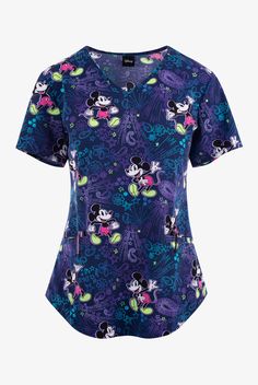 Tooniforms Bandana Land Mickey Mouse Women s 2-Pocket STRETCH V-Neck Print Scrub Top • Contemporary fit • V-neck • 2 front patch welt pockets • 1 right inner patch pocket • Short sleeve • Shirttail hem • Features Disney s iconic Mickey Mouse in a flurry of paisleys, shooting stars, and flowers on a navy background • Approximate length for size M is 27 3 4 • Manufacturer style TF737-MKBN Made with a poly-spandex blend, our Cherokee Tooniforms scrubs are the perfect silky and stretchy background f Stars And Flowers, Bold Shoes, Easy Stretches, Purple Reign, Navy Background, Disney S