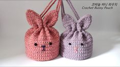 two small crocheted bags with bunny ears on them