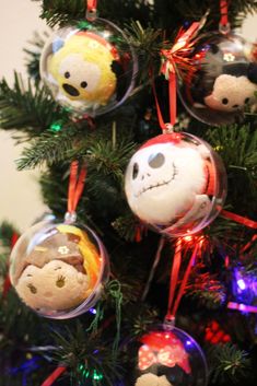 the ornaments are hanging from the christmas tree