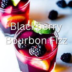 blackberry bourbon fizz is garnished with blackberries