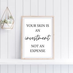 a white shelf with a black and white print on it that says, your skin is an investment not an expensive