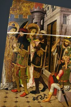 an image of a painting on the side of a building with people dressed in medieval clothing