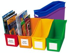 colorful plastic bins with labels on them for children's books and folders