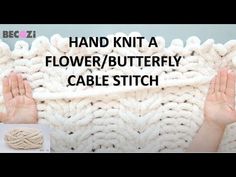 the hand knit flower / butterfly cable stitch pattern is shown with two hands on it