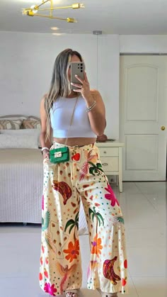 Step into the wild side of fashion with our nature-inspired printed pants - adorned with lush landscapes, exotic animals, and vibrant fruits. One Size Fits All Clothes, Hippie Outfits Summer, Flower Pants Outfit, Stella Outfits, Short Teen Dresses, Hippie Boho Outfits, Natural Outfit, Casual Vacation Outfits, Outfits For Spain