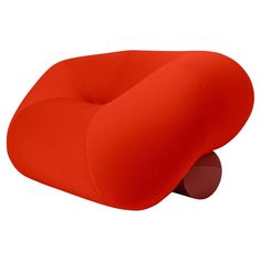 a red seat cushion sitting on top of a white floor