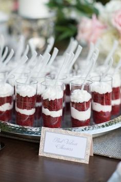 small desserts are lined up on a tray